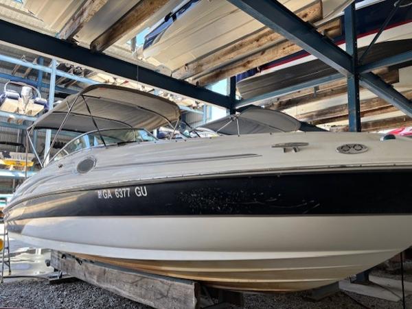 Sea Ray 240 Sundeck 2003 Sea Ray 240 Sundeck boat stored in a covered marina.