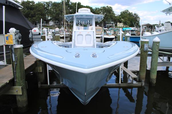 Yellowfin 36 Offshore 2024 Yellowfin 36 Offshore boat docked at marina, front view.