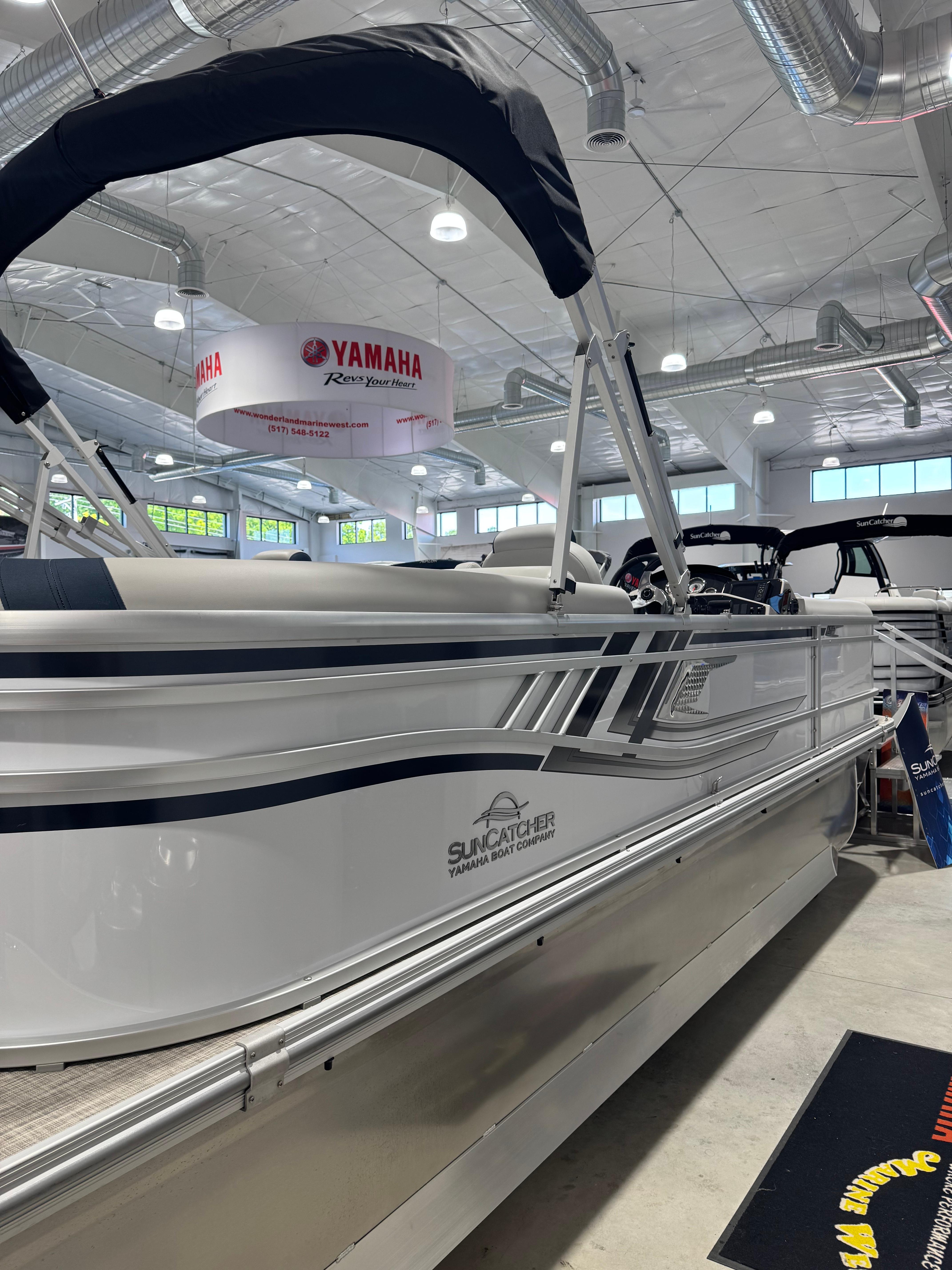 G3 Select 322RC 2025 G3 Select 322RC pontoon boat displayed indoors with Yamaha branding.