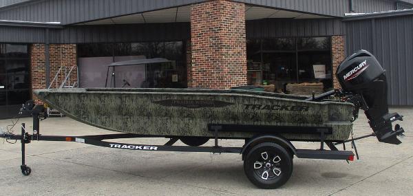 Tracker Grizzly® 1650 T Prairie Wings Edition 2025 Tracker Grizzly® 1650 T Prairie Wings Edition boat on trailer, outdoors.