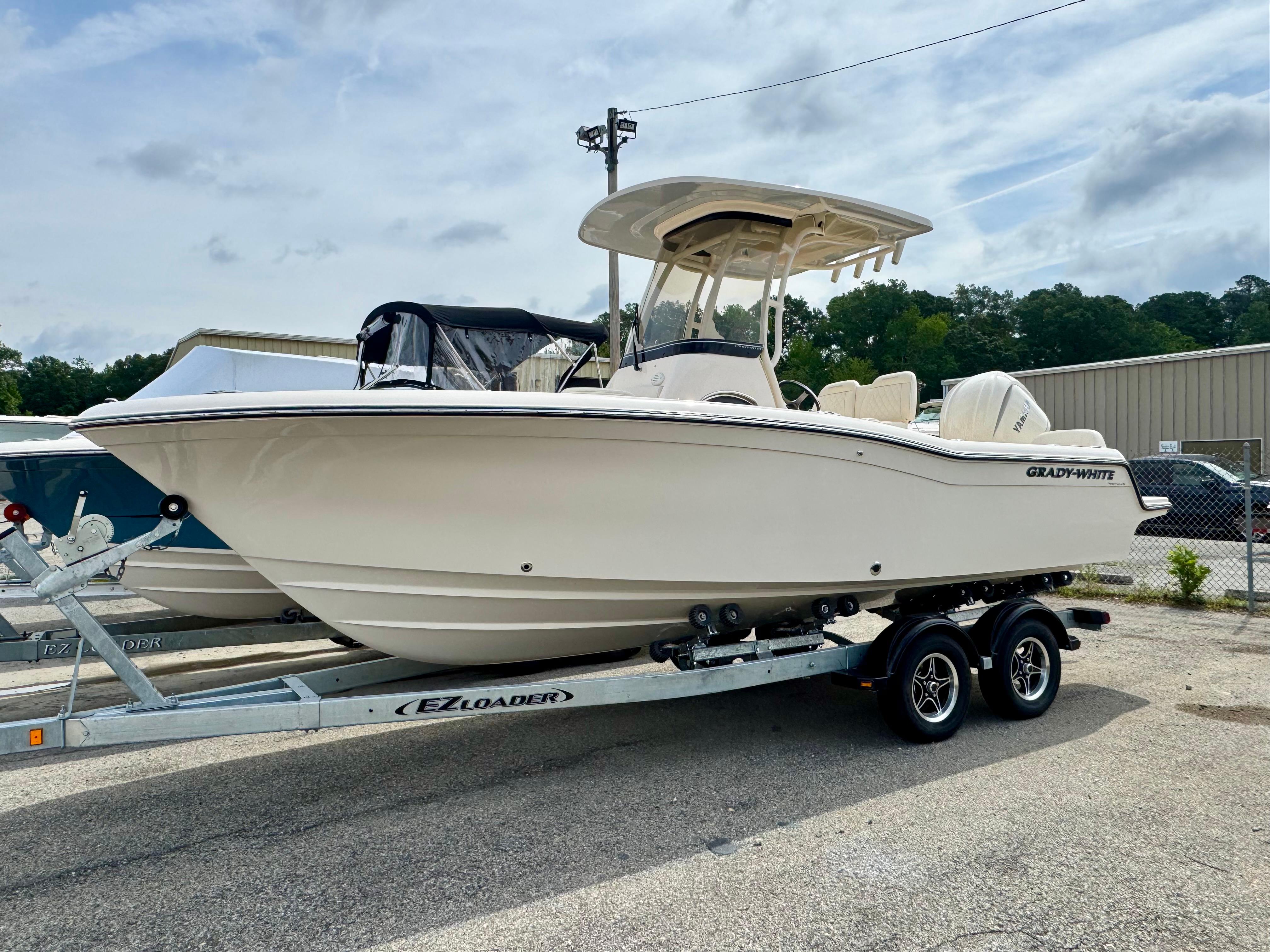 Grady-White Fisherman 216 2025 Grady-White Fisherman 216 boat on trailer, parked outdoors.