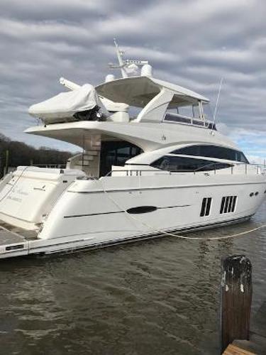 Princess 72 Motor Yacht 2012 Princess 72 Motor Yacht docked on a cloudy day.