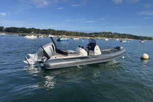 Grand GOLDEN LINE G680 2024 Grand GOLDEN LINE G680 boat on calm water with Honda outboard motor.