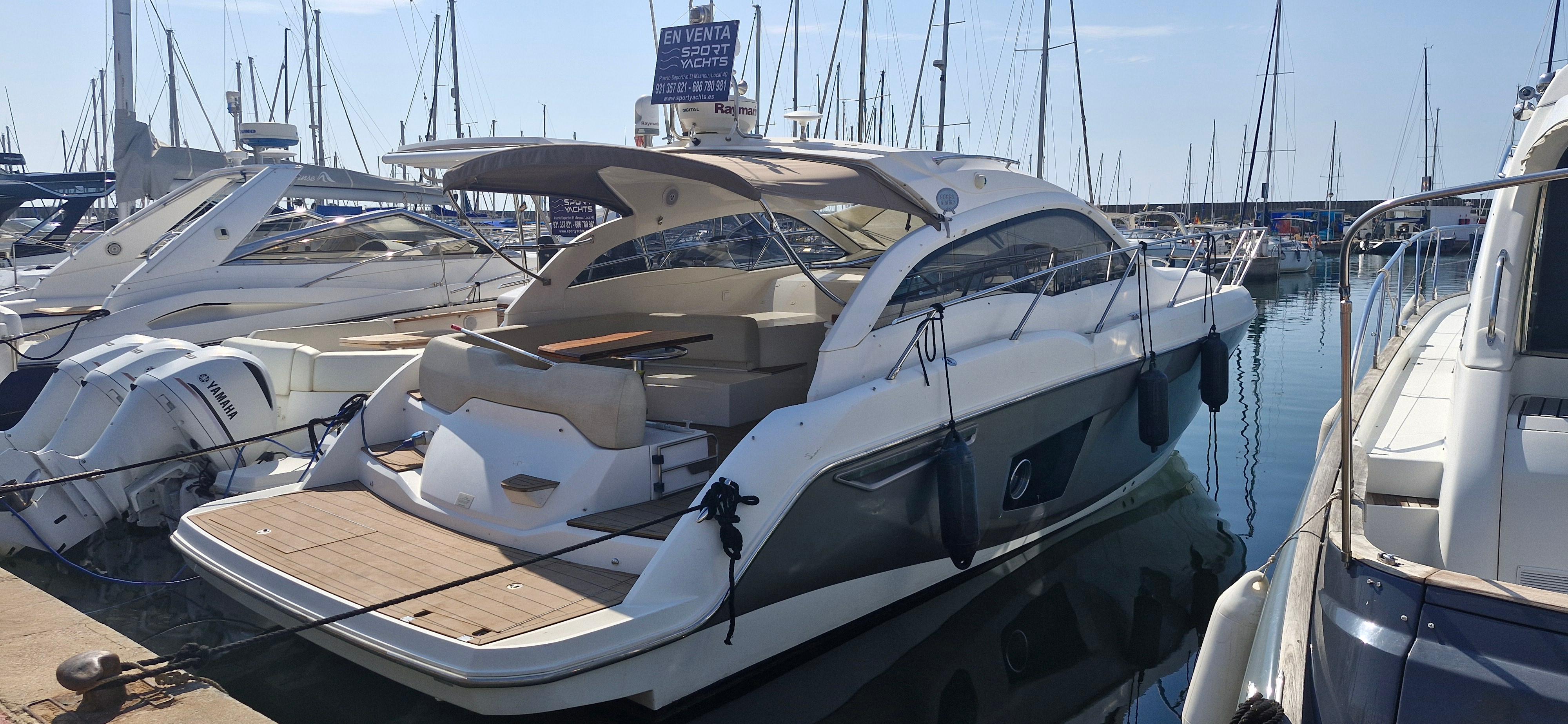 Sessa Marine C38 Sessa Marine C38 yacht, 2011 model, docked at marina with clear blue sky.