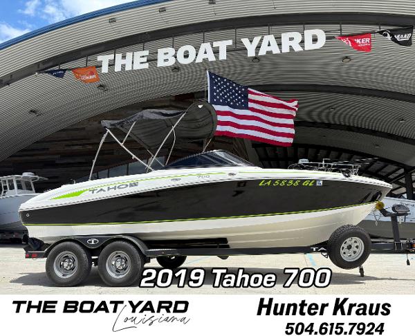 Tahoe 700 2019 Tahoe 700 boat displayed at The Boat Yard, Louisiana, with American flag.
