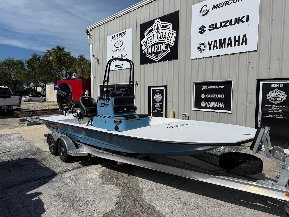 SCB S22 2025 SCB S22 boat on trailer at West Coast Marine dealership.