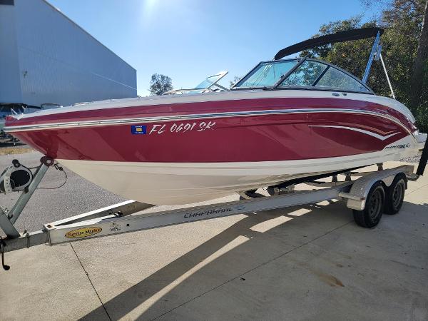 Chaparral Vortex 223 VRX 2016 Chaparral Vortex 223 VRX boat on trailer, red and white design.