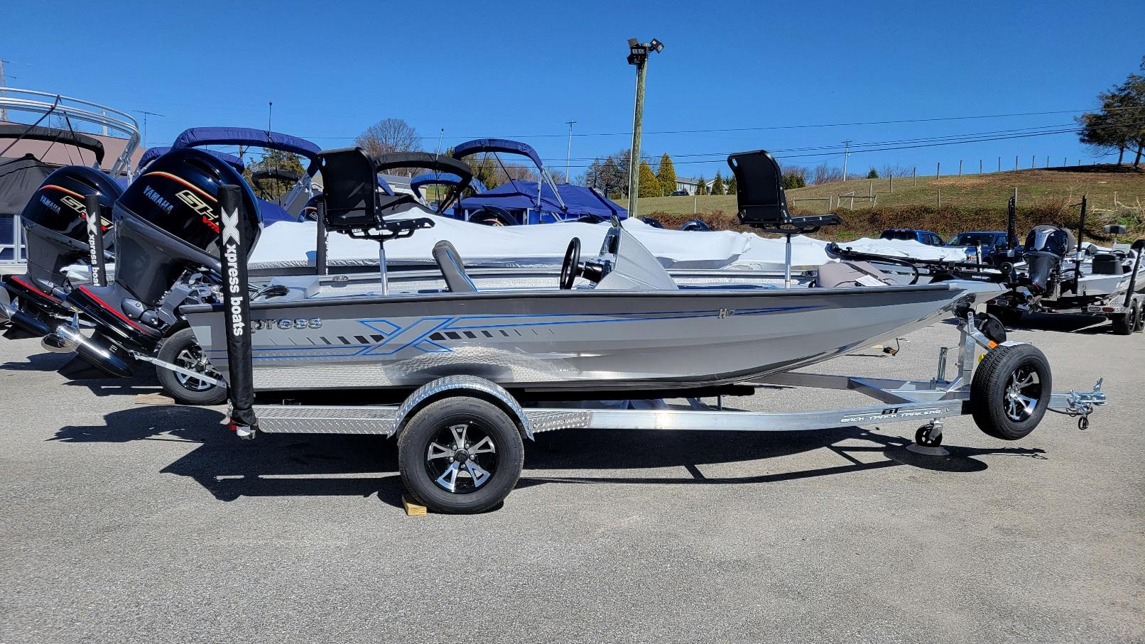Xpress H17C. 17' Crappie w/ Yamaha Vmax 90 (In Stock!) 2025 Xpress H17C Crappie boat with Yamaha Vmax 90, on trailer, in stock.