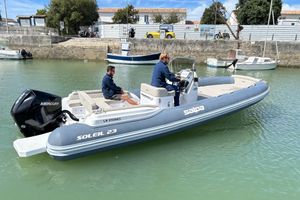 Salpa Soleil 23 2023 Salpa Soleil 23 boat with Mercury engine in a marina setting.