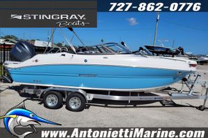 Stingray 211 DC 2025 Stingray 211 DC boat on trailer at Antonietti Marine dealership.