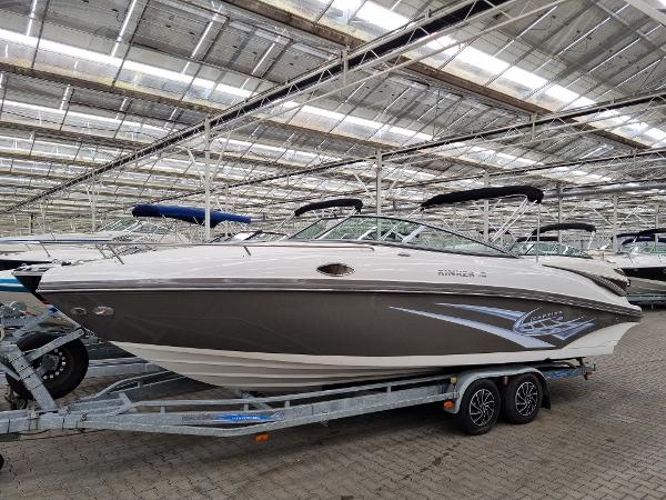 Rinker 246 Captiva 2012 Rinker 246 Captiva boat on trailer in indoor storage facility.
