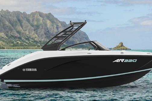 Yamaha Boats AR220 2026 Yamaha Boats AR220 on scenic water with mountain backdrop.