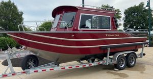 Spartan 240 MAXIMUS PRO XL 2024 Spartan 240 MAXIMUS PRO XL boat on a trailer, red and silver exterior.