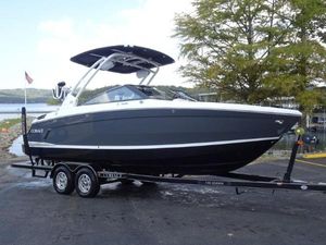 Cobalt R6 Surf 2025 Cobalt R6 Surf boat on trailer by lakeside.