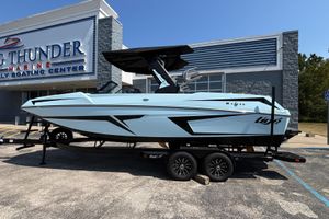 Tigé 24RZX 2026 Tigé 24RZX boat on trailer at Big Thunder Marine dealership.