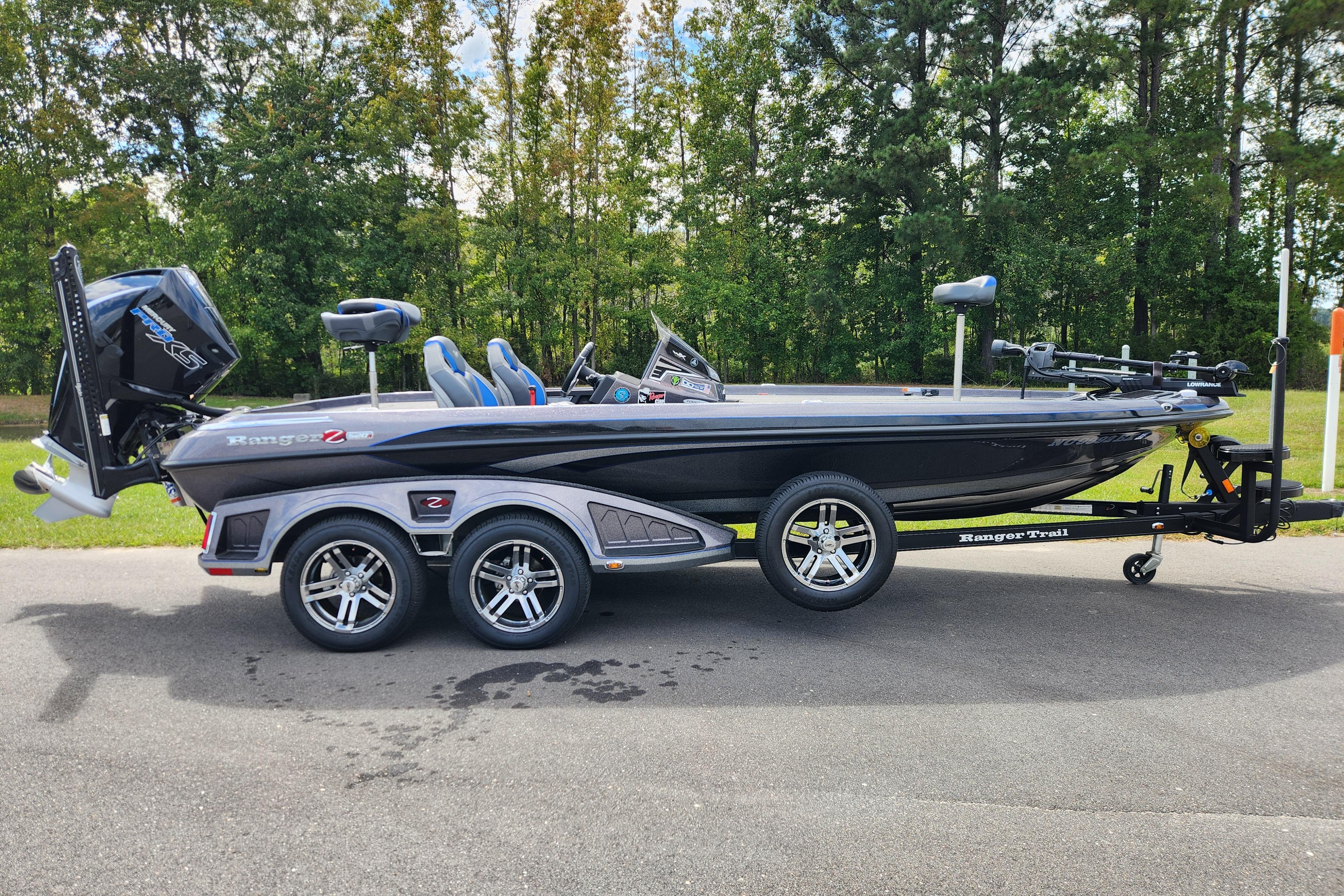 Ranger Z520R Ranger Cup Equipped 2022 Ranger Z520R Cup Equipped boat on trailer, parked on road with forest background.