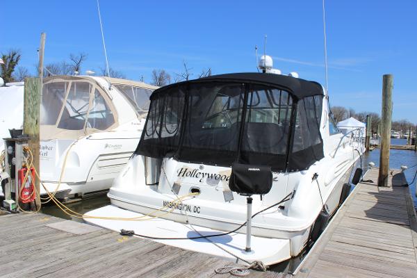 Sea Ray 400 Sundancer 1997 Sea Ray 400 Sundancer docked at marina, rear view.