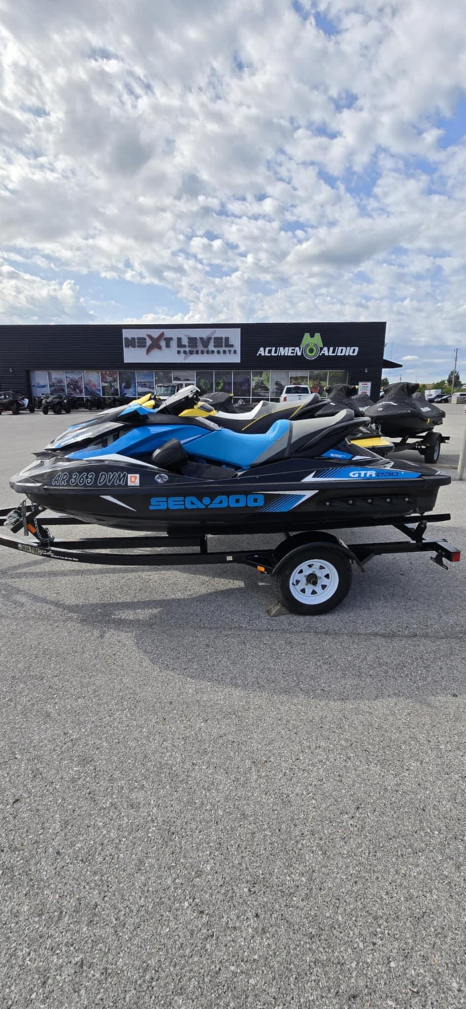 Sea-Doo GTR 230 2017 Sea-Doo GTR 230 jet ski on trailer, parked outdoors.