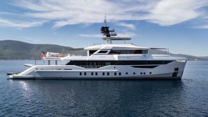 Bilgin Custom Luxurious 2023 Bilgin Custom yacht on calm sea with scenic mountain backdrop.