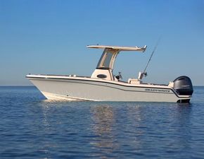 Grady-White Fisherman 216 2025 Grady-White 216 boat on calm water, featuring sleek design and modern amenities.