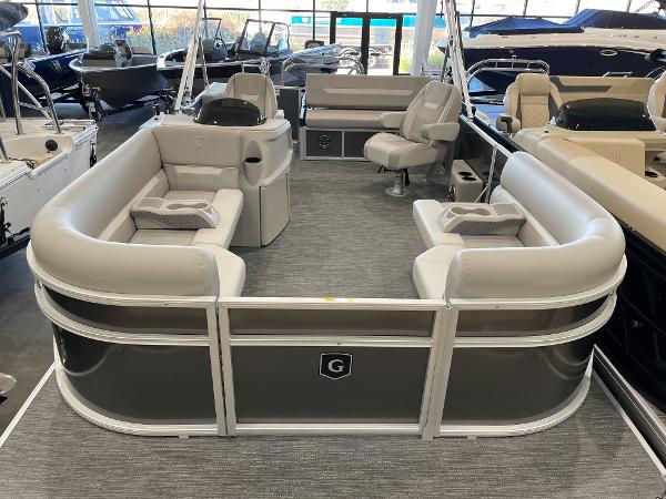 Godfrey EX2286SFLX 2025 Godfrey EX2286SFLX pontoon boat with spacious seating and modern design.