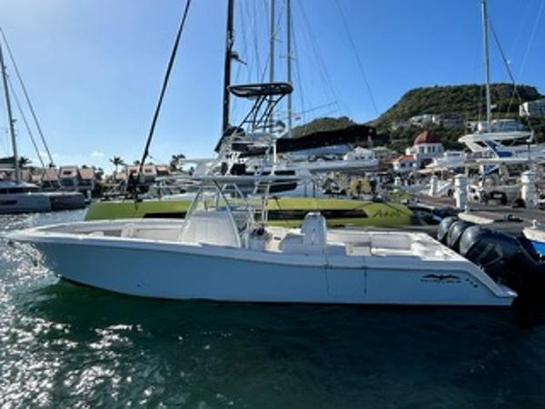 Invincible 39 Open Fisherman 2017 Invincible 39 Open Fisherman boat docked in a marina.