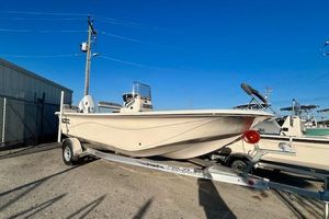 Carolina Skiff 19 LS 2025 Carolina Skiff 19 LS boat on trailer under clear blue sky.