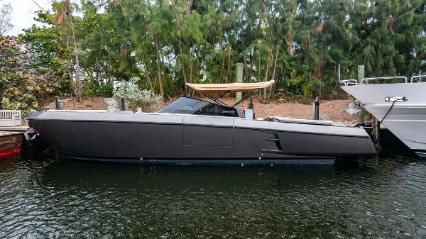 CNM 43 Continental 2015 CNM 43 Continental yacht docked by lush greenery.