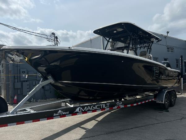 Key West 291 FS 2025 Key West 291 FS boat on Magic Tilt trailer, parked outdoors.