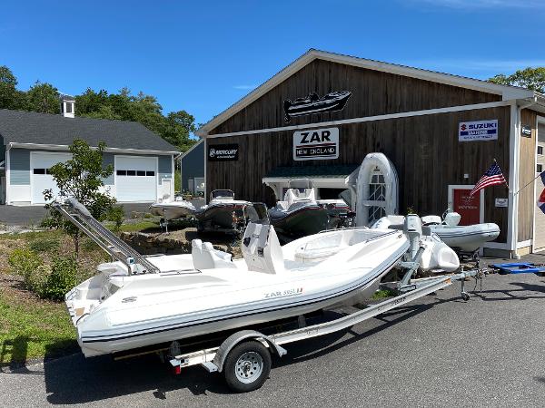 Zar Formenti 59 SL Limited 2024 Zar Formenti 59 SL Limited boat on trailer outside dealership.
