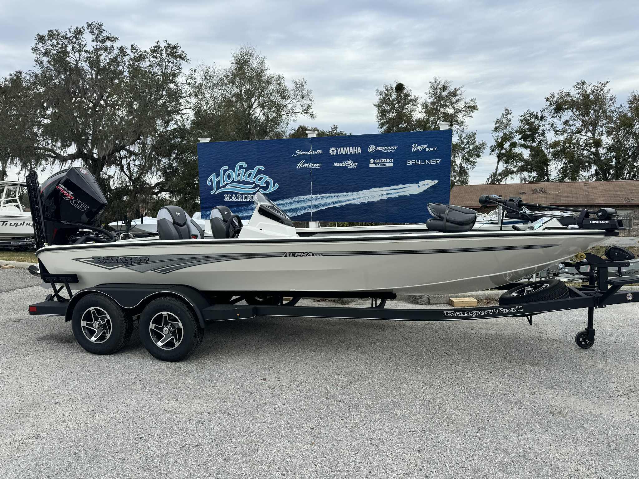 Ranger ALPHA 208 2025 Ranger ALPHA 208 boat on trailer at Holiday Marine dealership.