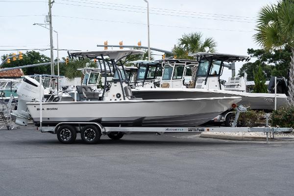 Sea Born FX24 Bay 2024 Sea Born FX24 Bay boat on a trailer in a marina.