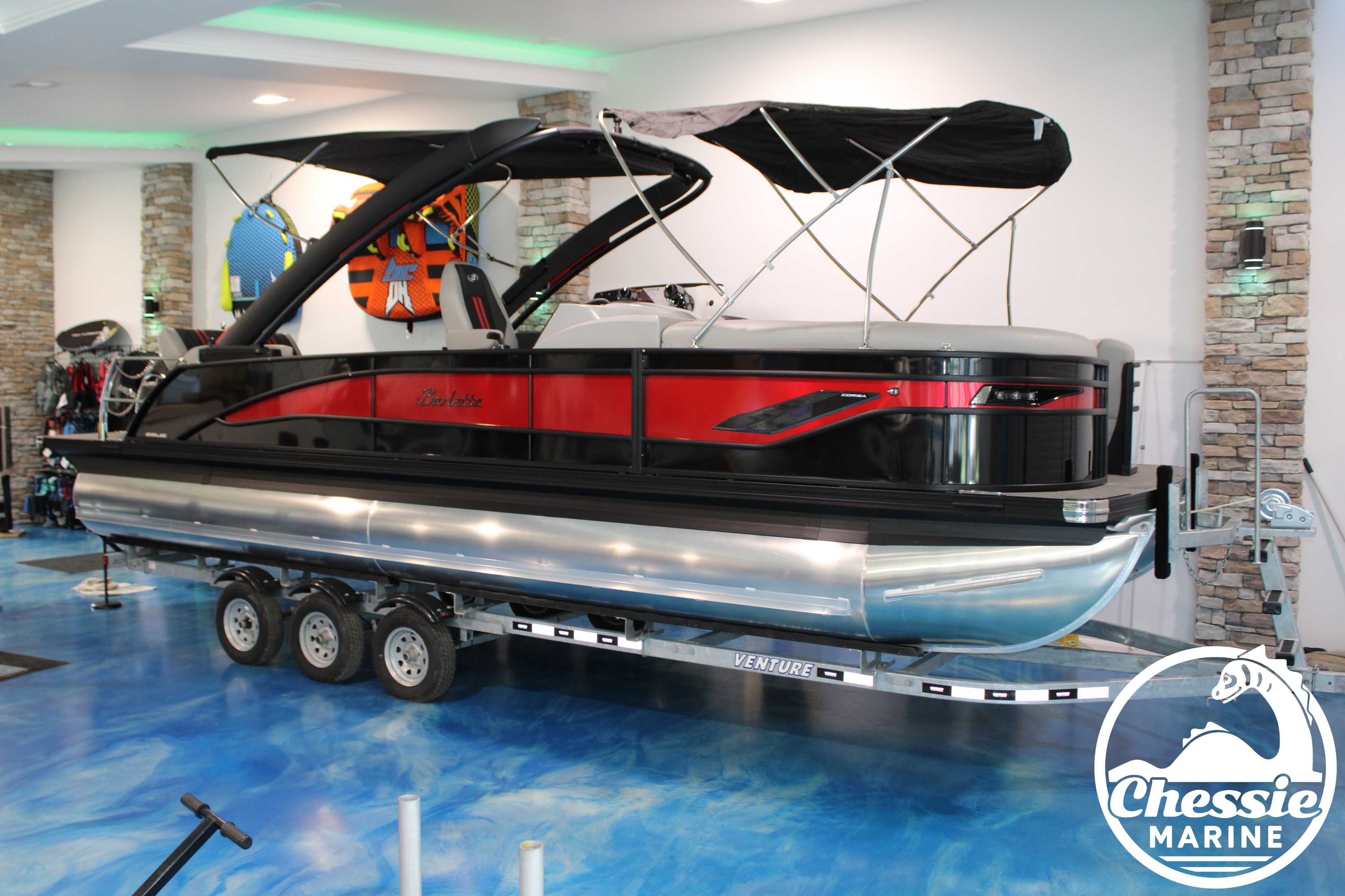 Barletta CORSA 25UEA 2026 Barletta CORSA 25UEA pontoon boat displayed indoors on a trailer.