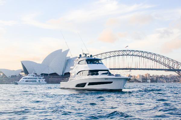 Riviera 64 Sports Motor Yacht 2021 Riviera 64 Sports Motor Yacht cruising near iconic Sydney landmarks.