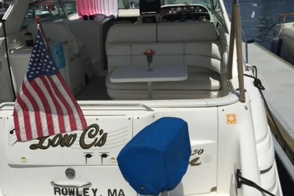 Sea Ray 330 Sundancer 1998 Sea Ray 330DA boat with American flag, docked in Rowley, MA.