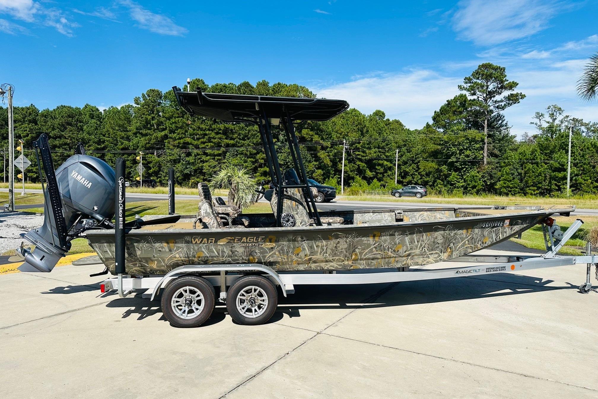 War Eagle 2170 Blackhawk 2024 War Eagle 2170 Blackhawk boat on trailer, featuring Yamaha motor, parked outdoors.