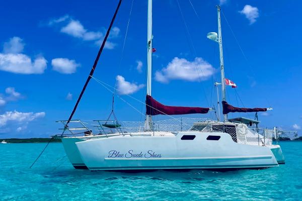 Custom Horstman Tristar Ketch Sailing yacht "Blue Suede Shoes" on clear blue water, Custom Horstman Tristar Ketch, 1980.