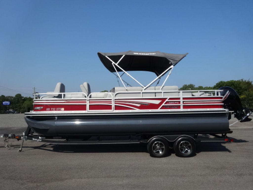 Ranger Reata 2021 Ranger REATA pontoon boat with canopy on trailer, side view.