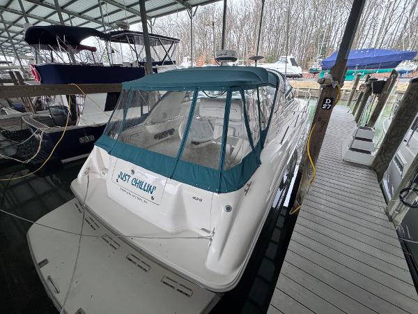Sea Ray 450 Sundancer 1995 Sea Ray 450 Sundancer docked under a covered marina.