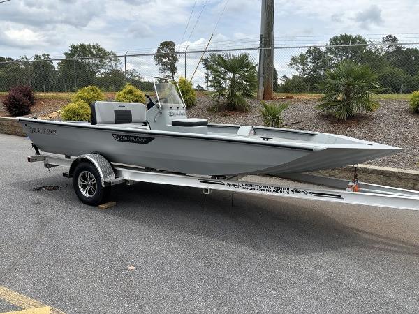 SeaArk Shadow 18 Center Console 2025 SeaArk Shadow 18 Center Console boat on trailer, parked outdoors.