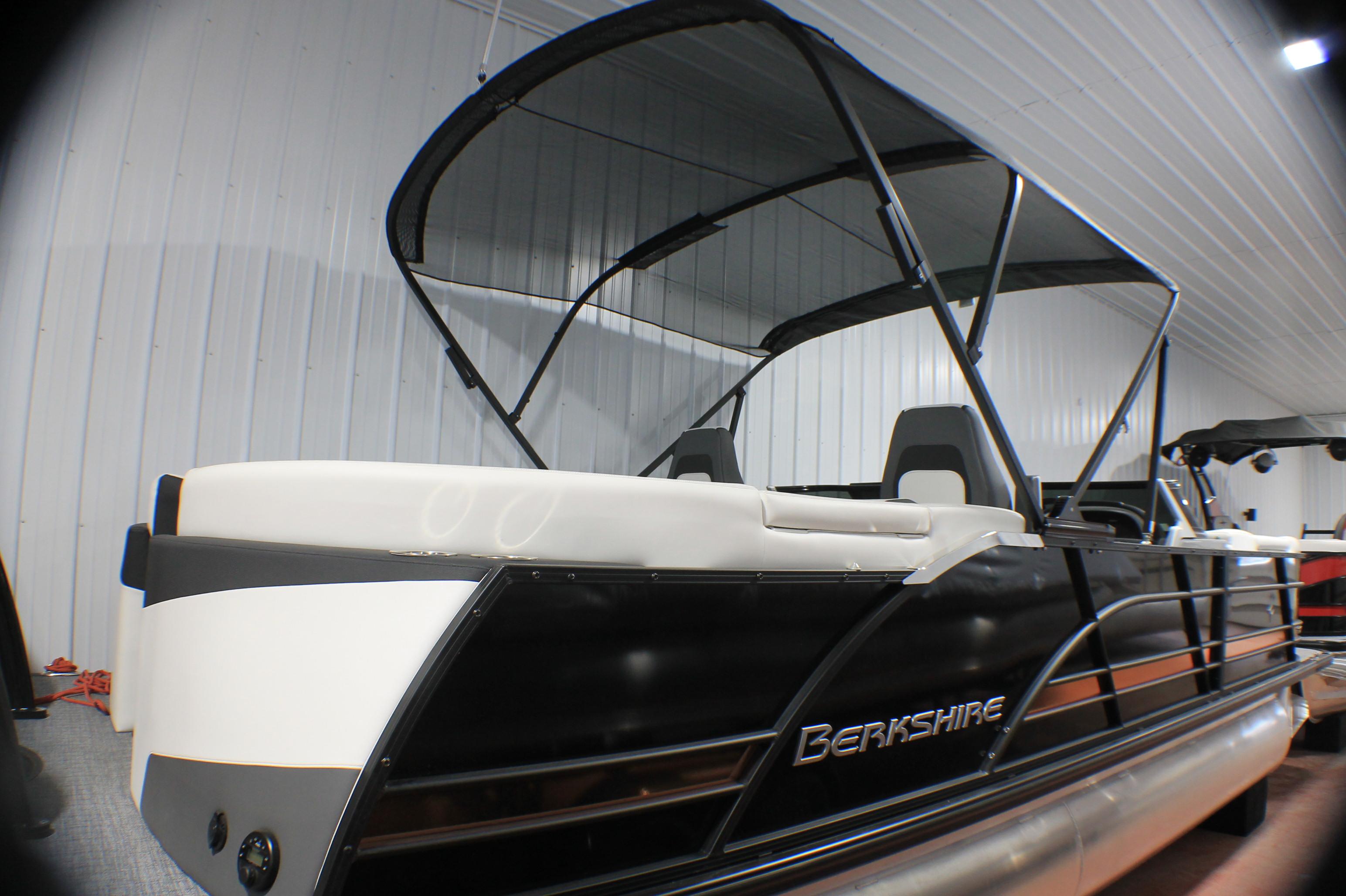 Berkshire 25RFX-DC STS 2024 Berkshire 25RFX-DC STS pontoon boat with sleek design in indoor showroom.