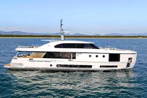 Azimut Magellano 30M 2024 Azimut Magellano 30M yacht cruising on open water, side view.