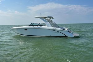Cobalt R30 2019 Cobalt R30 boat on calm sea under clear sky.