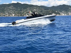 Wally WALLYTENDER 43 X 2023 Wally WALLYTENDER 43 X yacht cruising on blue ocean near scenic coastline.