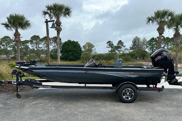 Ranger RT188P 2025 Ranger RT188P boat on trailer, parked outdoors with palm trees in background.