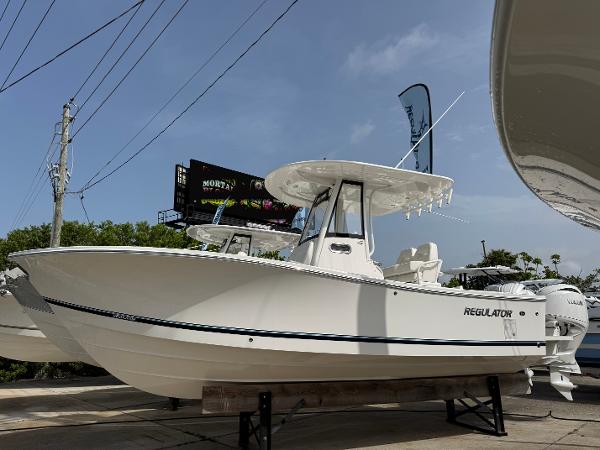Regulator 23 2025 Regulator 23 boat displayed outdoors on a sunny day.