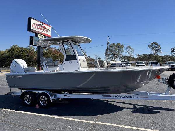 Sportsman Masters 247 2025 Sportsman Masters 247 boat on trailer in parking lot, clear sky background.