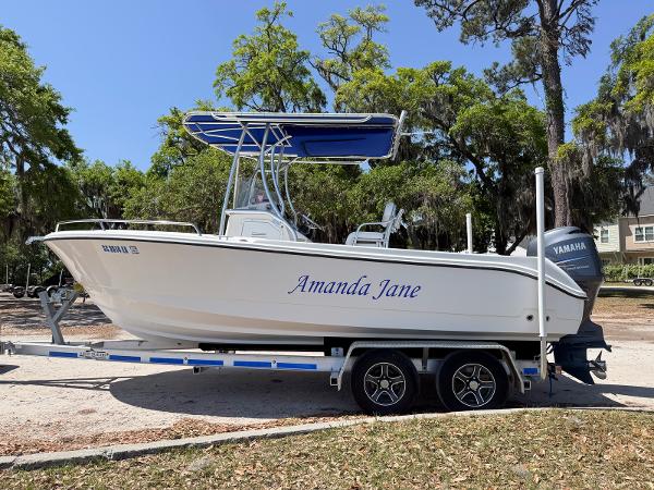 Edgewater 205CC 2012 Edgewater 205CC boat named "Amanda Jane" on a trailer, parked outdoors.