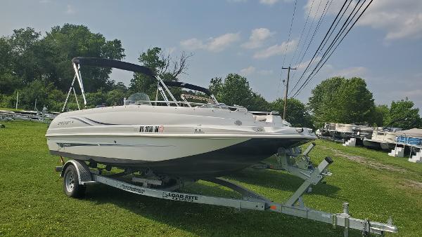 Starcraft Limited 1915 OB 2016 Starcraft Limited 1915 OB boat on trailer, parked on grassy area.