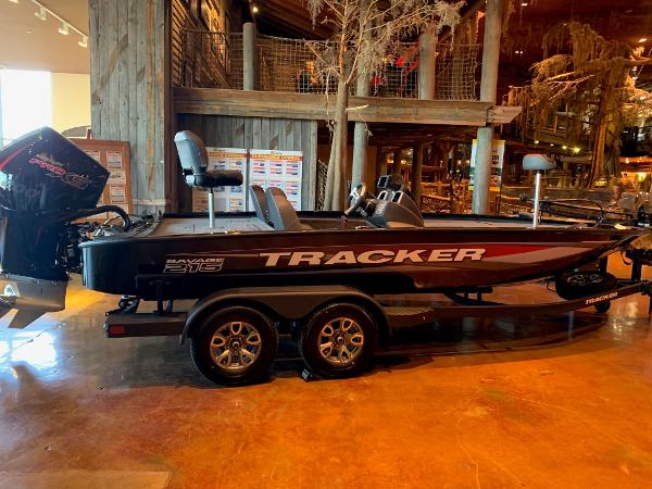 Tracker Savage 215 2025 Tracker Savage 215 boat displayed indoors on a trailer.